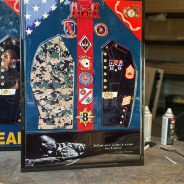 Medium End of Service display with Marine Corps colors, uniform, and dedication plate